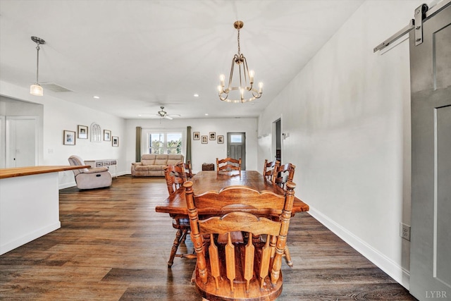 664 Collins Ferry Rd, Gladys, VA 24554 - dining area featuring a barn door, a chandelier, dark wood-style floors, recessed lighting, and baseboards