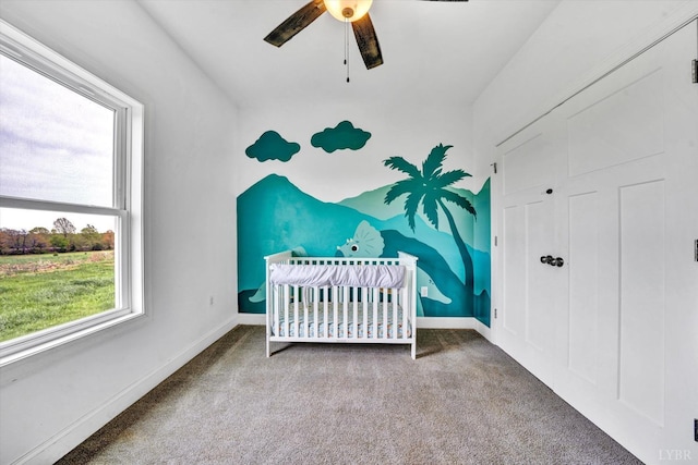 664 Collins Ferry Rd, Gladys, VA 24554 - bedroom featuring carpet flooring, a crib, baseboards, and ceiling fan