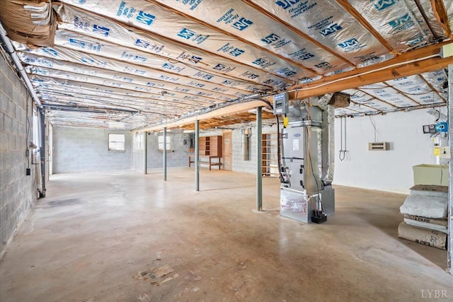123 Knollwood Dr, Hurt, VA 24563 - below grade area featuring heating unit and concrete block wall