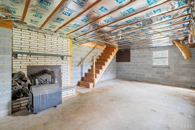 123 Knollwood Dr, Hurt, VA 24563 - below grade area with stairway and a wood stove