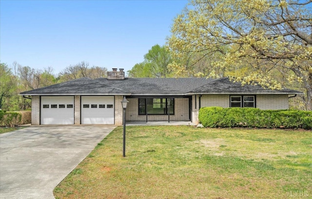 123 Knollwood Dr, Hurt, VA 24563 - view of front facade with a garage, driveway, brick siding, a front yard, and a chimney