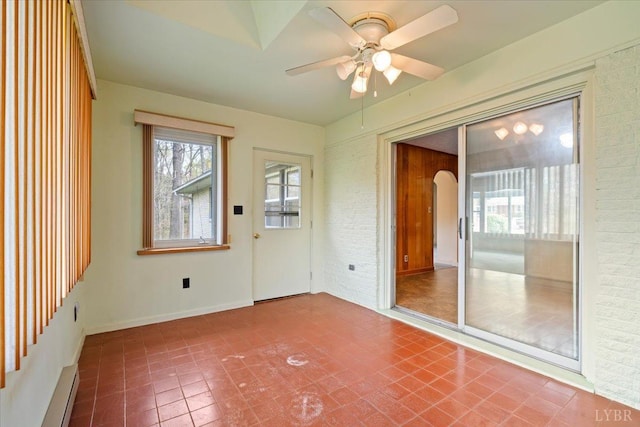 123 Knollwood Dr, Hurt, VA 24563 - unfurnished sunroom with a baseboard radiator and arched walkways