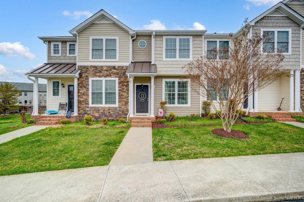 200 Rowse Dr, Lynchburg, VA 24502 - townhome / multi-family property featuring stone siding, a front lawn, and a standing seam roof
