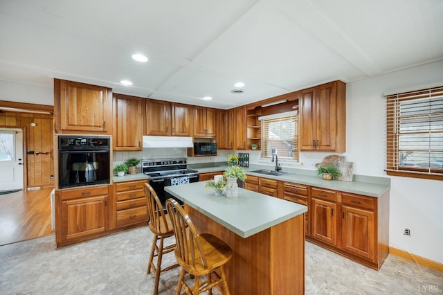kitchen with black appliances, a sink, under cabinet range hood, recessed lighting, and open shelves