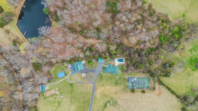 aerial view of property's location featuring a large body of water