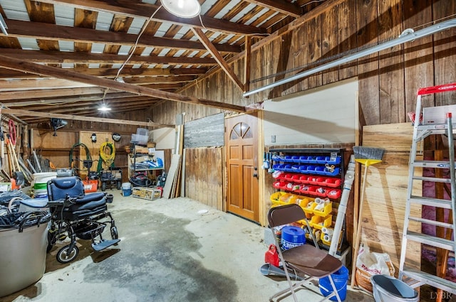 garage with wood walls