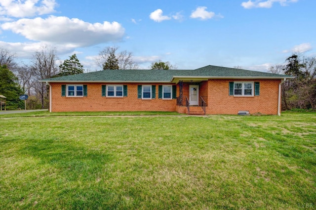 ranch-style home with brick siding and a front lawn