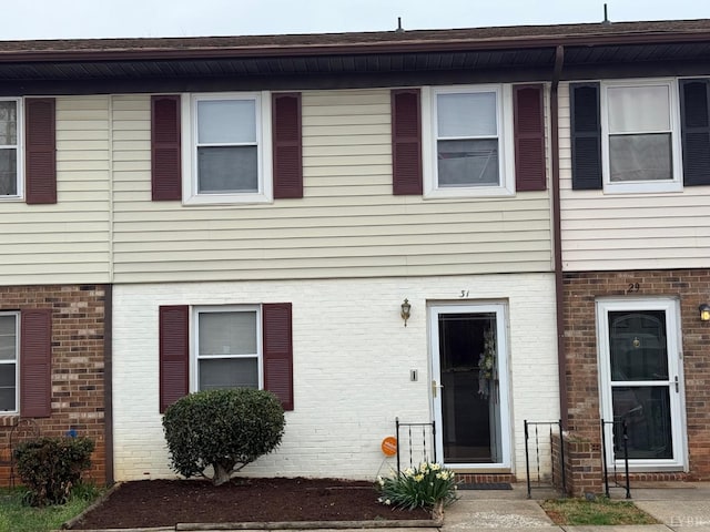 multi unit property with brick siding