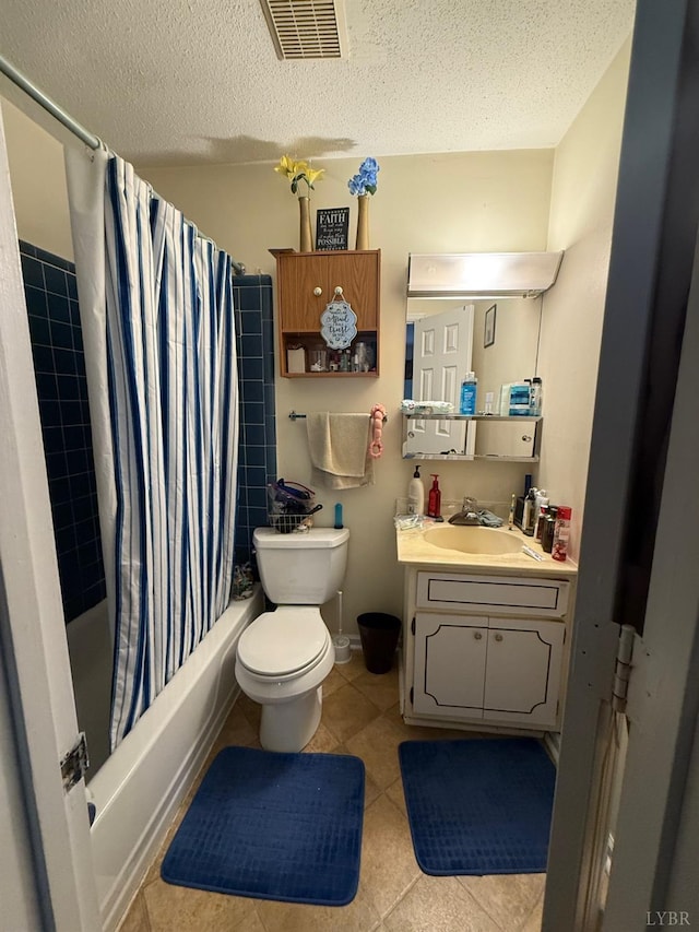 31 Westdale Dr, Lynchburg, VA 24501 - full bath with toilet, a textured ceiling, tile patterned flooring, and visible vents