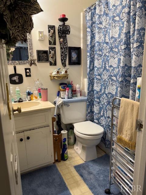17 Westdale Dr, Lynchburg, VA 24501 - full bath featuring toilet, tile patterned floors, vanity, and a shower with curtain