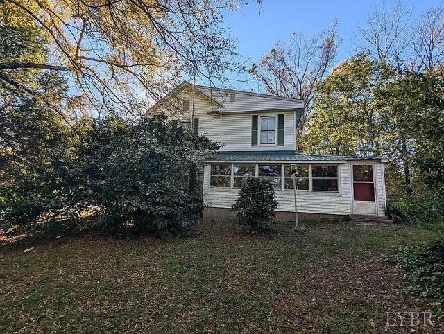 201 Charlotte Ave, Phenix, VA 23959 - view of property exterior with metal roof