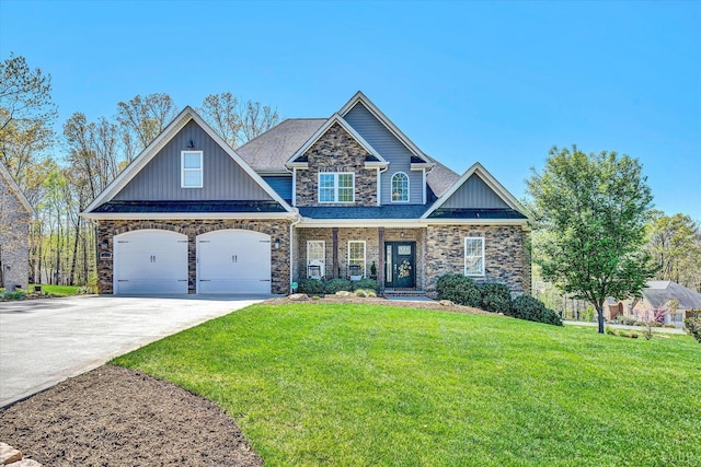 1062 Ivy Creek Dr, Forest, VA 24551 - craftsman-style house with concrete driveway, a front lawn, stone siding, covered porch, and board and batten siding