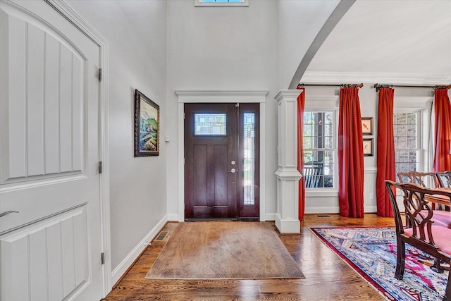 1062 Ivy Creek Dr, Forest, VA 24551 - foyer featuring plenty of natural light, arched walkways, ornate columns, and wood finished floors