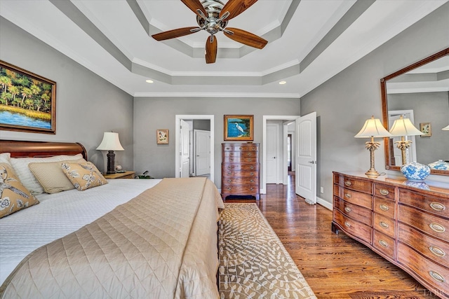 1062 Ivy Creek Dr, Forest, VA 24551 - bedroom featuring a tray ceiling, ornamental molding, wood finished floors, recessed lighting, and baseboards