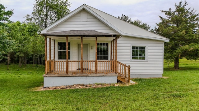 15939 Richmond Hwy, Pamplin, VA 23958 - view of front facade with covered porch, a front lawn, and a shingled roof
