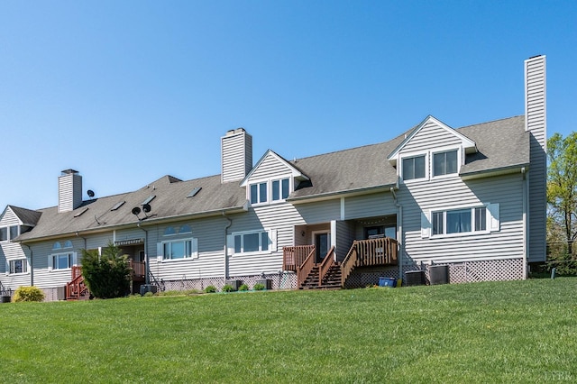 502 Fairwinds Ct, Forest, VA 24551 - rear view of house with a chimney, a yard, a deck, and cooling unit