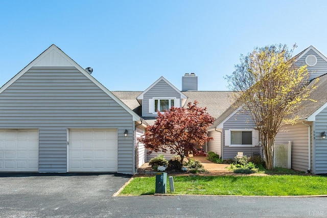 502 Fairwinds Ct, Forest, VA 24551 - view of front of property with asphalt driveway and a chimney