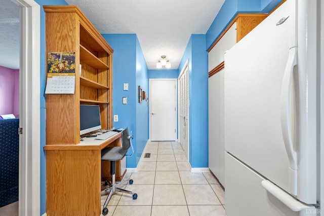 502 Fairwinds Ct, Forest, VA 24551 - office with light tile patterned flooring, baseboards, a textured ceiling, and built in study area