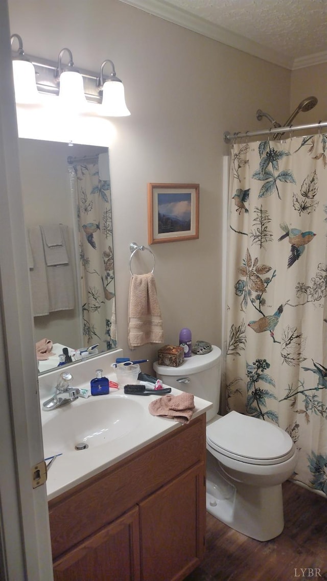 618 Prospect Rd, Hurt, VA 24563 - bathroom featuring toilet, wood finished floors, vanity, ornamental molding, and a textured ceiling