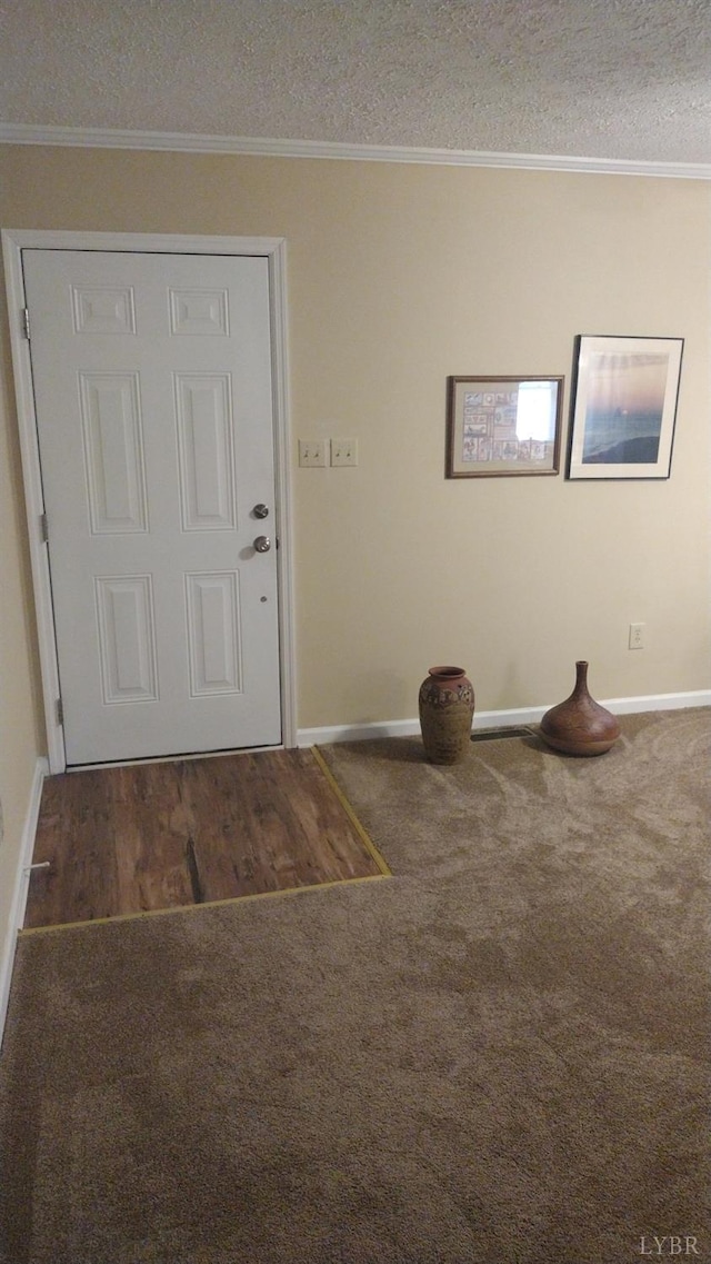 618 Prospect Rd, Hurt, VA 24563 - foyer entrance with baseboards, carpet flooring, and crown molding