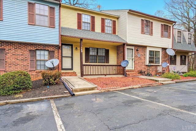 43 Nags Head Ct, Lynchburg, VA 24502 - multi unit property with uncovered parking, a porch, and brick siding