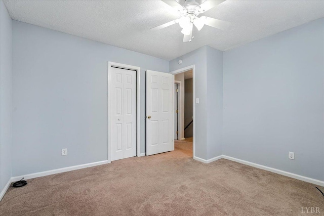 43 Nags Head Ct, Lynchburg, VA 24502 - unfurnished bedroom with light carpet, baseboards, a closet, a textured ceiling, and ceiling fan