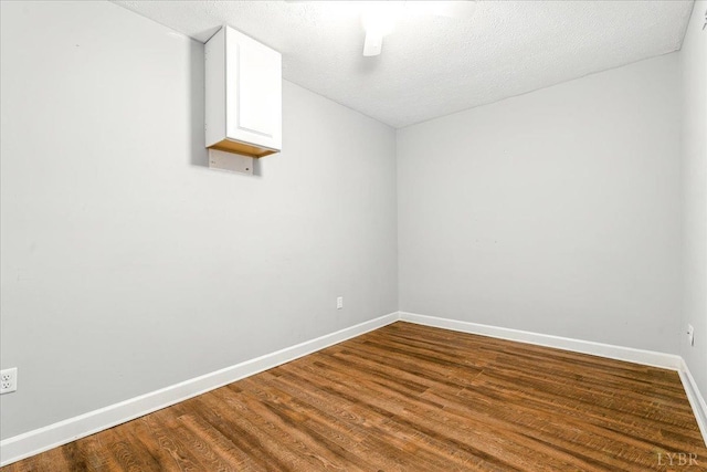 43 Nags Head Ct, Lynchburg, VA 24502 - empty room with wood finished floors, baseboards, and a textured ceiling