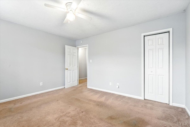 43 Nags Head Ct, Lynchburg, VA 24502 - unfurnished bedroom with carpet, baseboards, a closet, a textured ceiling, and ceiling fan