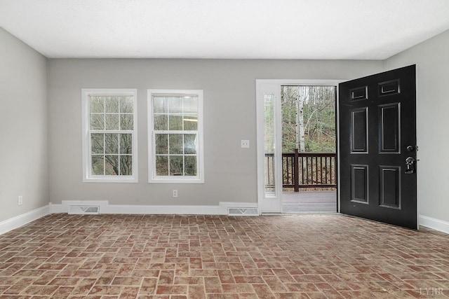 108 Trapper Ln, Vinton, VA 24179 - entryway with brick flooring and baseboards