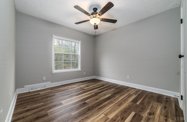 108 Trapper Ln, Vinton, VA 24179 - unfurnished room with dark wood-style flooring, a textured ceiling, ceiling fan, and baseboards