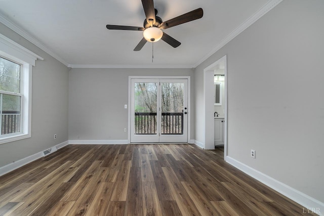 108 Trapper Ln, Vinton, VA 24179 - empty room with a ceiling fan, ornamental molding, dark wood-style floors, and baseboards