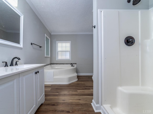 108 Trapper Ln, Vinton, VA 24179 - bathroom with a textured ceiling, a shower, wood finished floors, a bath, and crown molding