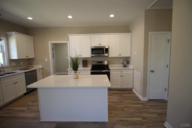 625 S St, Bedford, VA 24523 - kitchen featuring stainless steel appliances, white cabinetry, dark wood-type flooring, a sink, and recessed lighting