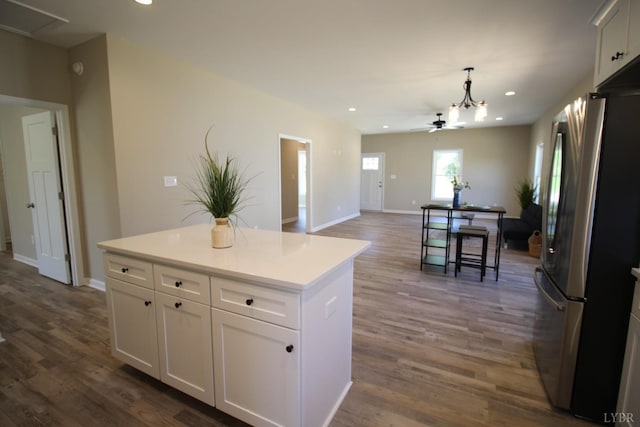 625 S St, Bedford, VA 24523 - kitchen with freestanding refrigerator, recessed lighting, white cabinetry, dark wood-style flooring, and baseboards