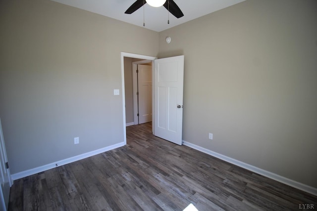 625 S St, Bedford, VA 24523 - unfurnished room with a ceiling fan, dark wood-type flooring, and baseboards