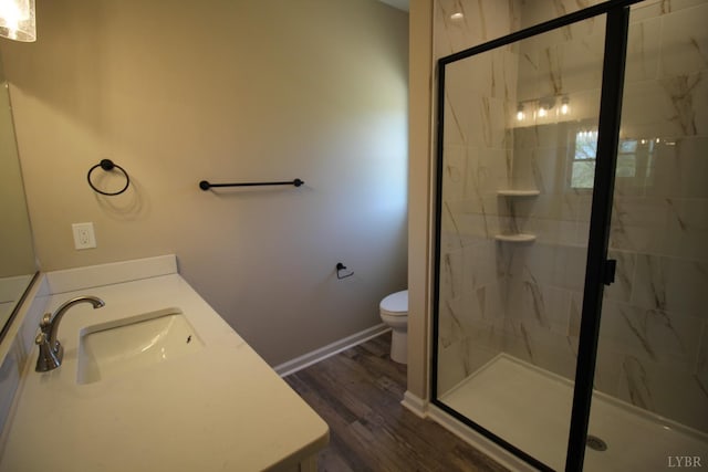 625 S St, Bedford, VA 24523 - bathroom featuring vanity, wood finished floors, a marble finish shower, and toilet
