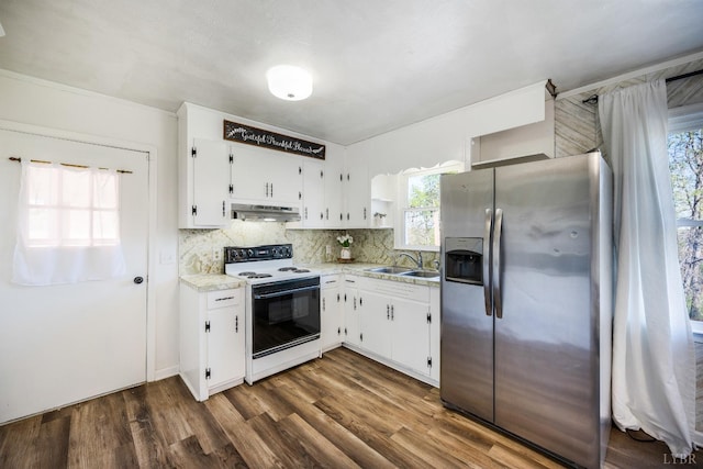 2477 Mountain Rd, Gretna, VA 24557 - kitchen with stainless steel fridge with ice dispenser, under cabinet range hood, dark wood-type flooring, electric stove, and a sink