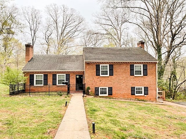 1428 Club Dr, Lynchburg, VA 24503 - split level home with a chimney, brick siding, and a shingled roof