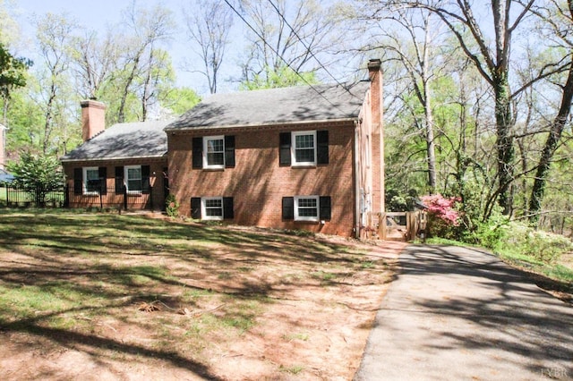 1428 Club Dr, Lynchburg, VA 24503 - rear view of property with a chimney, asphalt driveway, and brick siding