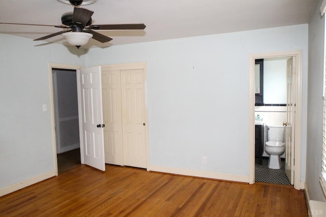 1428 Club Dr, Lynchburg, VA 24503 - unfurnished bedroom featuring wood finished floors, baseboards, a closet, and ensuite bath