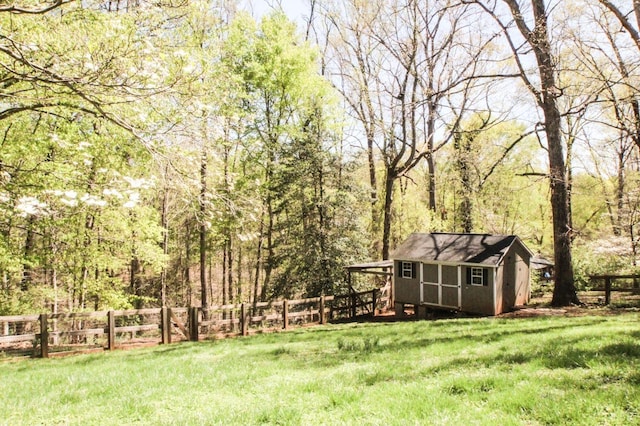1428 Club Dr, Lynchburg, VA 24503 - view of yard featuring an outbuilding, a shed, and a wooded view