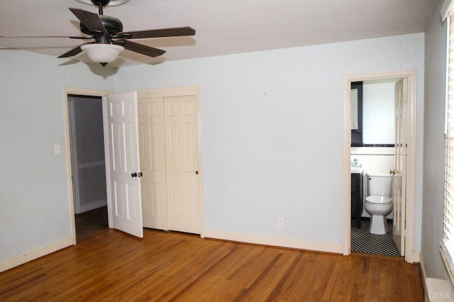 1428 Club Dr, Lynchburg, VA 24503 - unfurnished bedroom featuring wood finished floors, a closet, baseboards, ensuite bath, and a ceiling fan