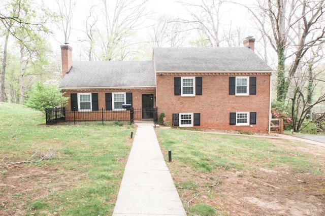 1428 Club Dr, Lynchburg, VA 24503 - view of front of house with a chimney, brick siding, and a shingled roof