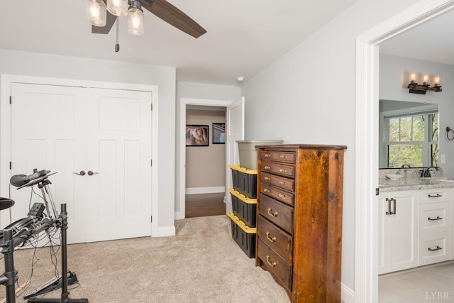 1085 Tori Ct, Forest, VA 24551 - bedroom with baseboards, a closet, light carpet, a ceiling fan, and a sink