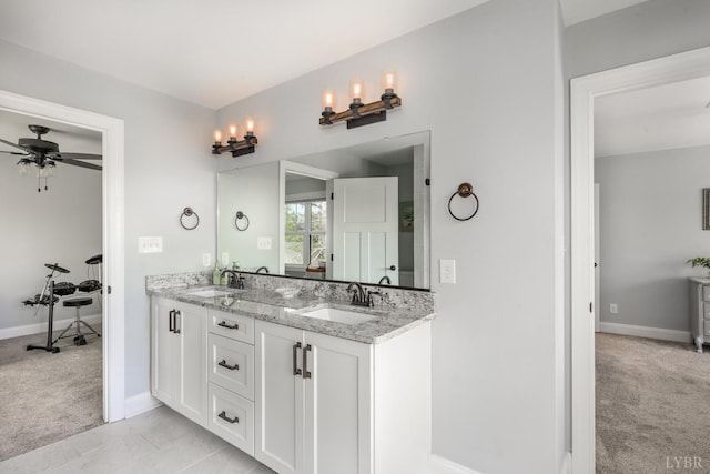 1085 Tori Ct, Forest, VA 24551 - bathroom with a sink, baseboards, double vanity, and a ceiling fan