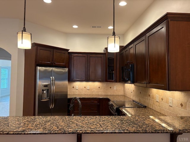 621 Capstone Dr, Lynchburg, VA 24502 - kitchen with stainless steel fridge, black electric range, dark brown cabinetry, glass insert cabinets, and dark stone countertops