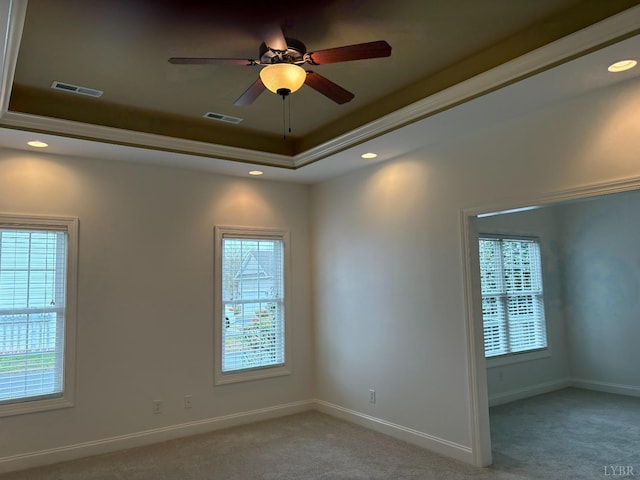 621 Capstone Dr, Lynchburg, VA 24502 - empty room with light colored carpet, a tray ceiling, a ceiling fan, baseboards, and recessed lighting