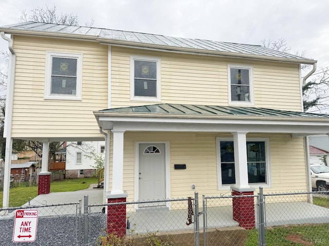1225 Early St, Lynchburg, VA 24502 - view of front of home with covered porch, a standing seam roof, a gate, metal roof, and a fenced front yard
