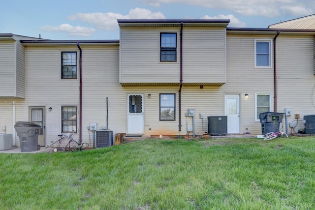 8108 Timberlake Rd Unit 135, Lynchburg, VA 24502 - rear view of house with central AC and a yard