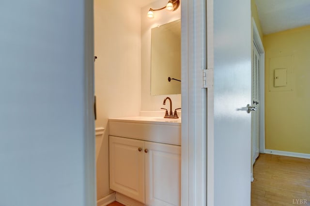 8108 Timberlake Rd Unit 135, Lynchburg, VA 24502 - bathroom featuring wood finished floors, vanity, and baseboards